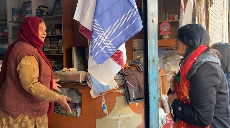 Mahie Gill meets a woman vendor in Ferozepur's bazaar. | Revathi Krishnan | ThePrint