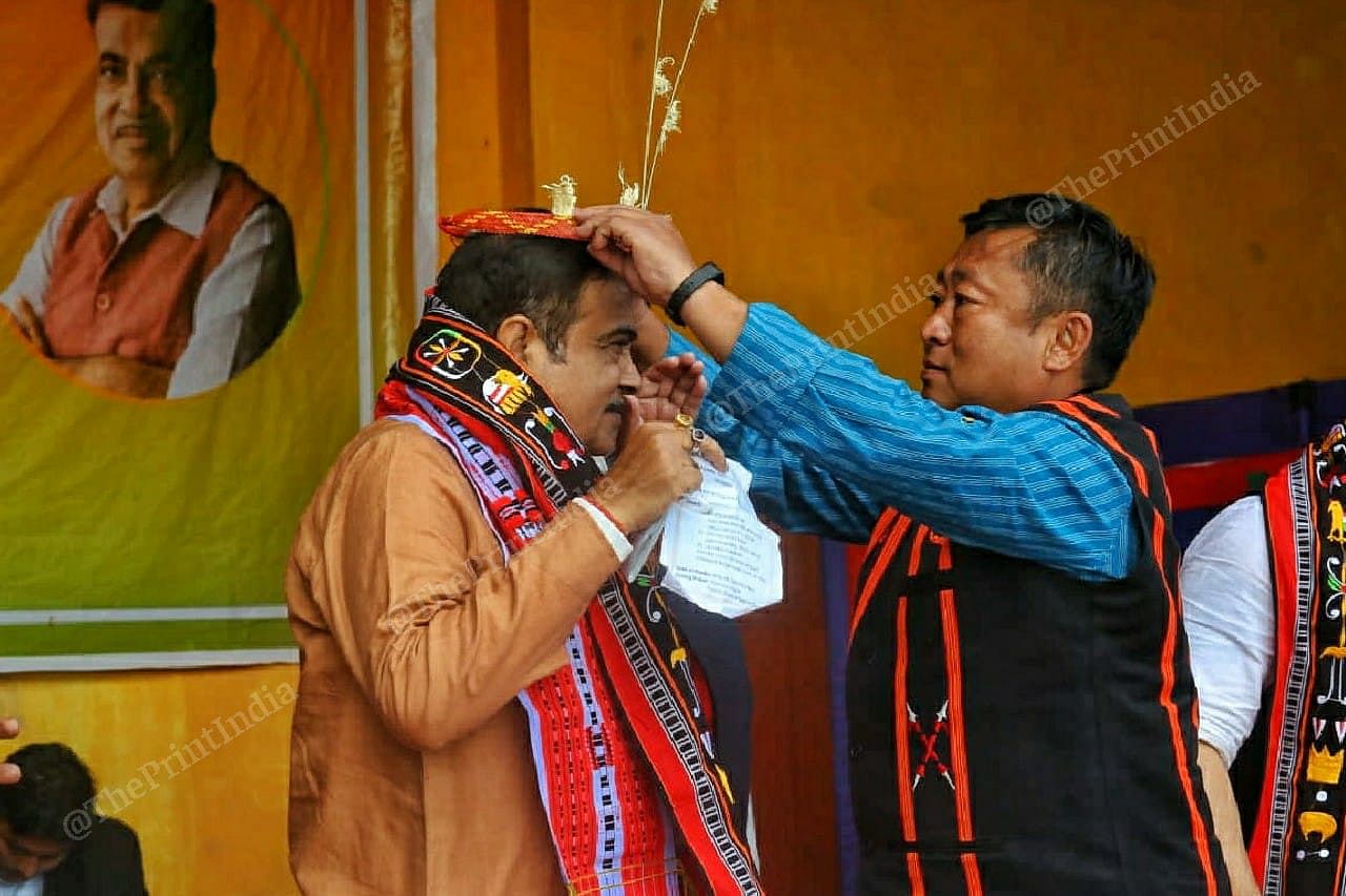 Union Minister Nitin Gadkari being felicitated with a Tangkhul Naga headpiece at BJP rally in Ukhrul at Manipur | Praveen Jain | ThePrint