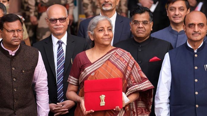 Nirmala Sitharaman and other members of the finance ministry pose for a photography for the Budget, on 1 February 2022, where Data Protection Bill was set to pass | Bloomberg
