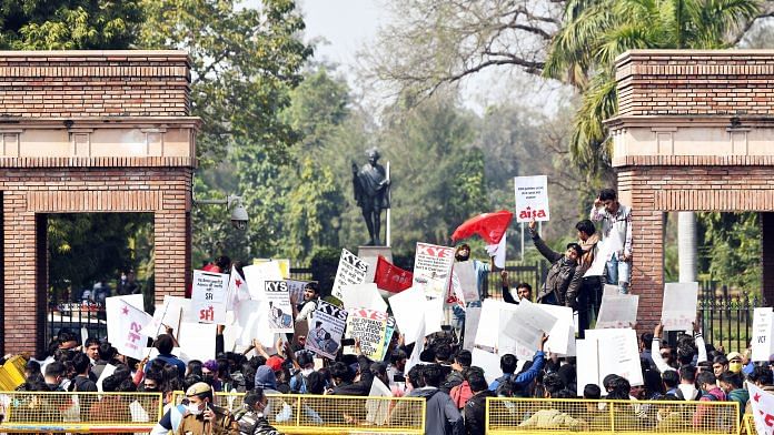 Students protest over reopening of Delhi University in New Delhi, on 7 February