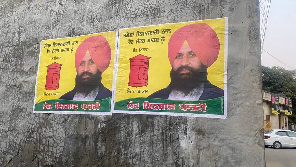 Posters for Simarjeet Singh Bains and the Lok Insaaf Party in Atam Nagar, Ludhiana | Photo: Revathi Krishnan | ThePrint