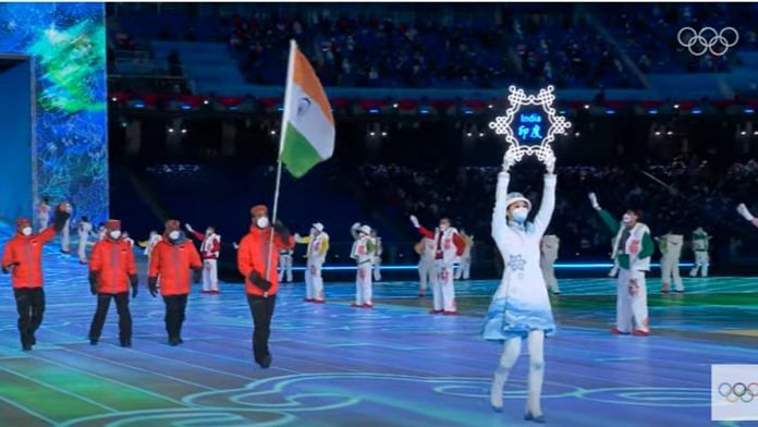 Screengrab of skier Arif Khan carrying the tricolor at the opening ceremony of the Beijing Winter Olympics, on 4 February 2022 | Photo: Olympics Youtube channel