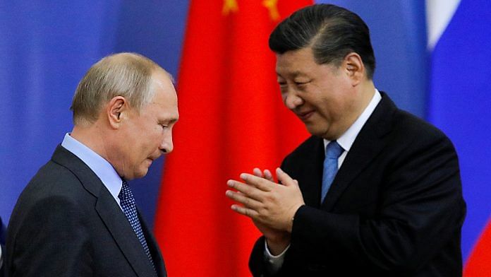 File photo of Xi Jinping, President of China and Russian President Vladimir Putin in St. Petersburg | Reuters via ANI