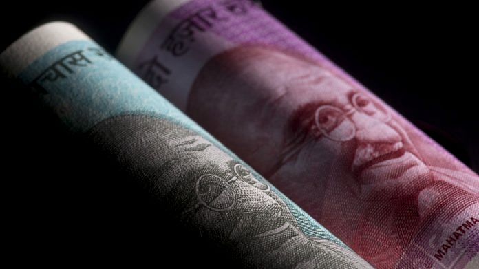 The portrait of Mahatma Gandhi on a Rs 50 and Rs 2000 banknotes | Photo: Brent Lewin | Bloomberg
