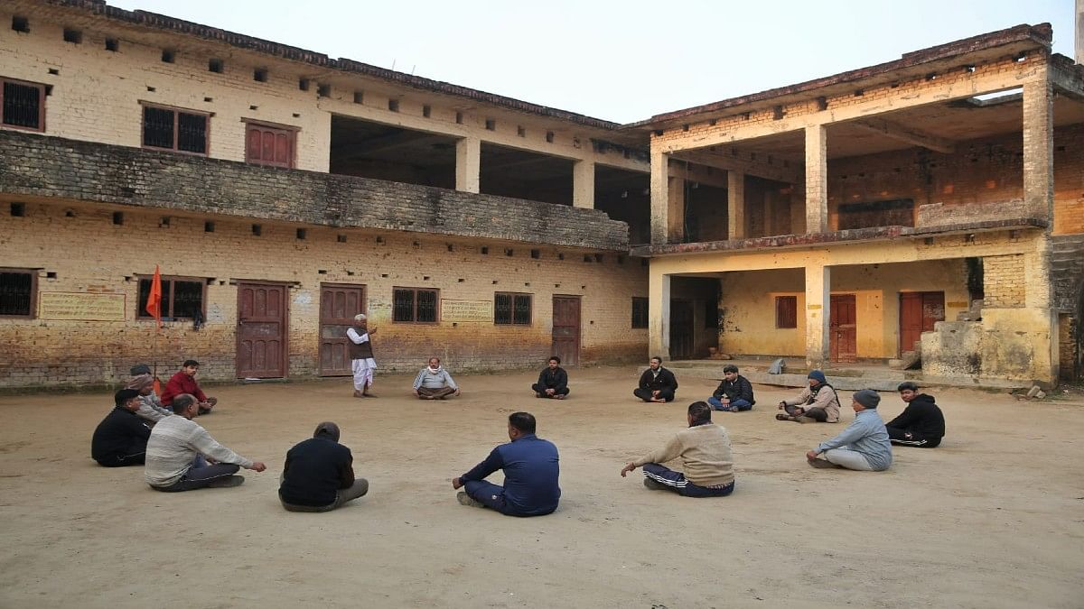 RSS members attend an early morning session at a shakha in Moharipur | Suraj Singh Bisht | ThePrint