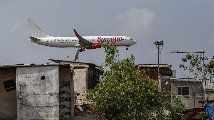 A SpiceJet aircraft lands at Chhatrapati Shivaji International Airport in Mumbai