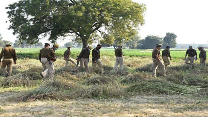 Kanpur police at the field where the body was found | Shikha Salaria | ThePrint