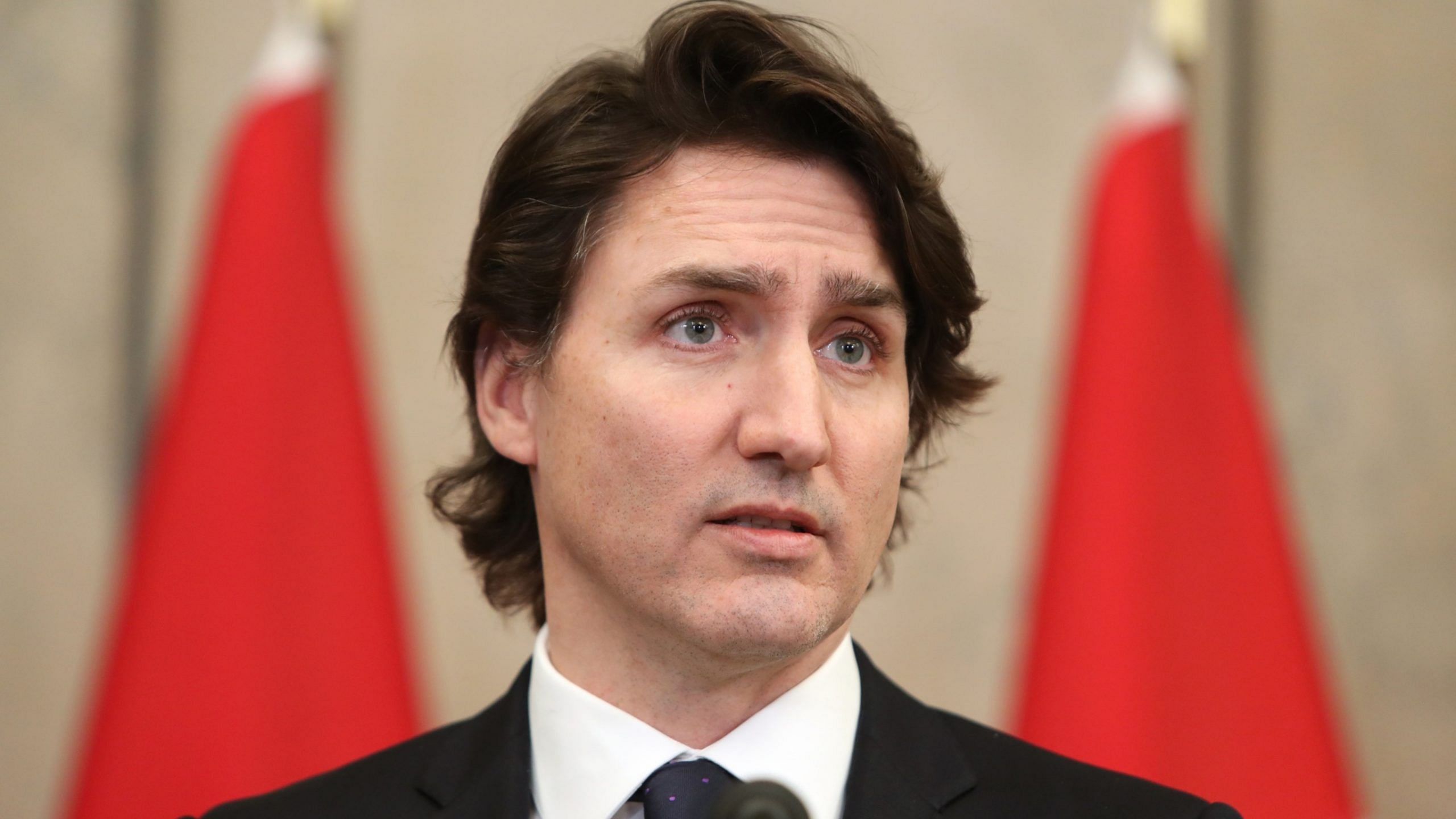 justin trudeau invokes emergency, seeks to choke off cash flow to protesters in canada