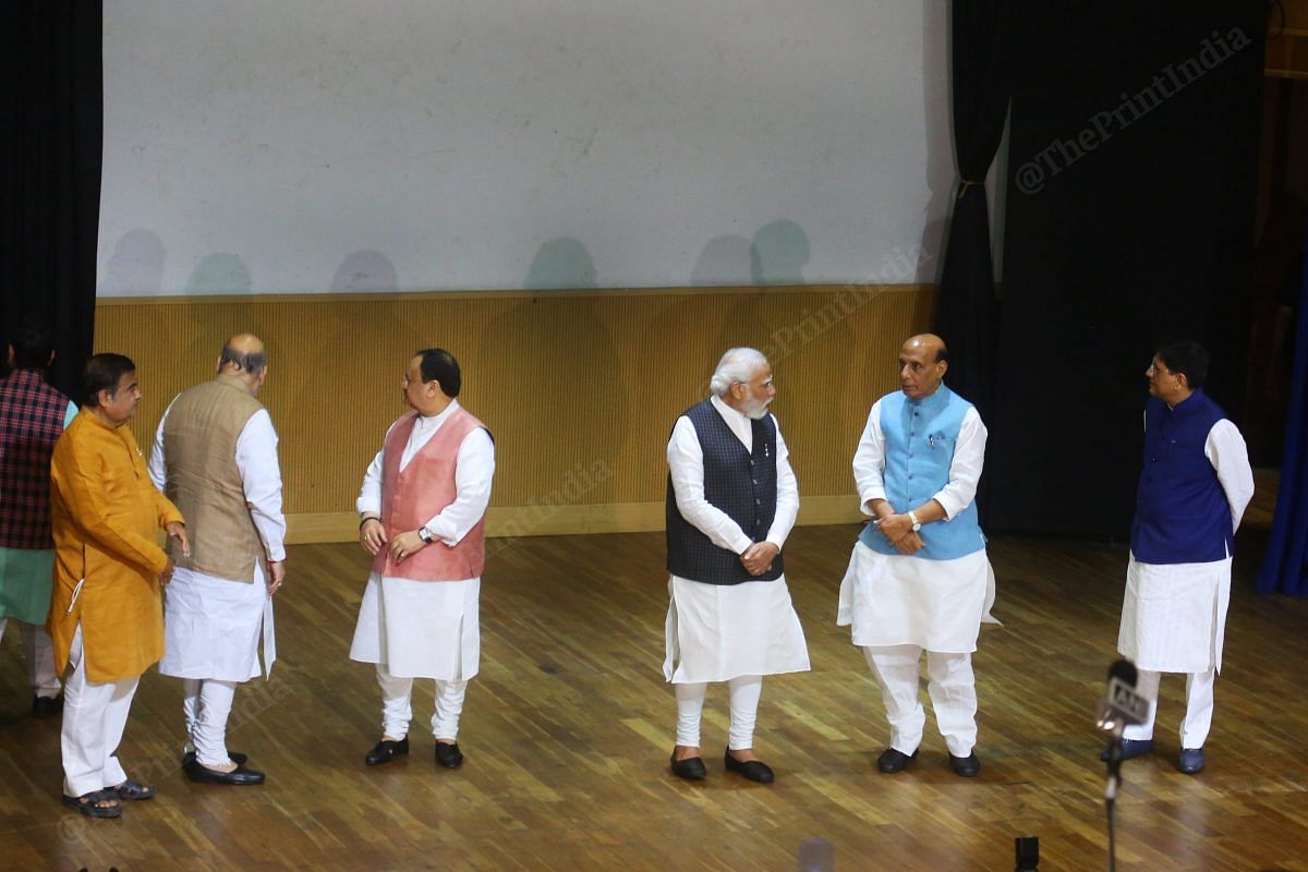Left to right: Road Transport Minister Nitin Gadkari, Home Minister Amit Shah, BJP President J.P. Nadda, PM Modi, Defence Minister Rajnath Singh and Commerce and Industry Minister Piyush Goyal on the dais for PM Modi's felicitation | Photo: Praveen Jain | ThePrint