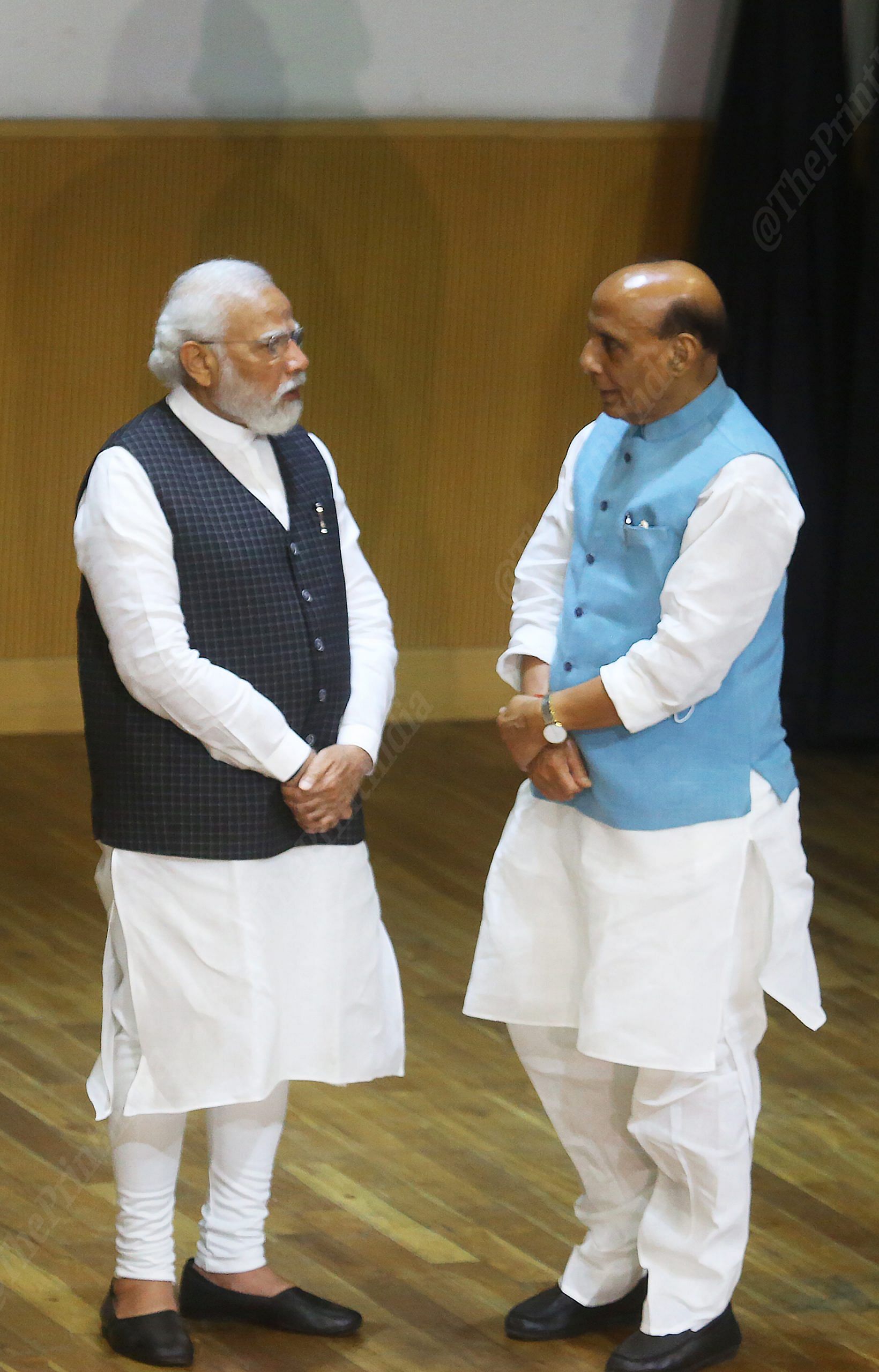 PM Modi talks to Defence Minister Rajnath SIngh at the meeting | Photo: Praveen Jain | ThePrint