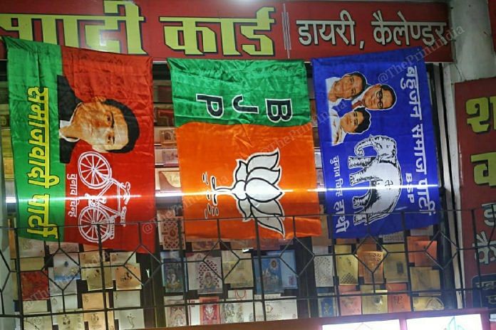 Flags of three parties contesting in Uttar Pradesh | Photo: Praveen Jain | ThePrint