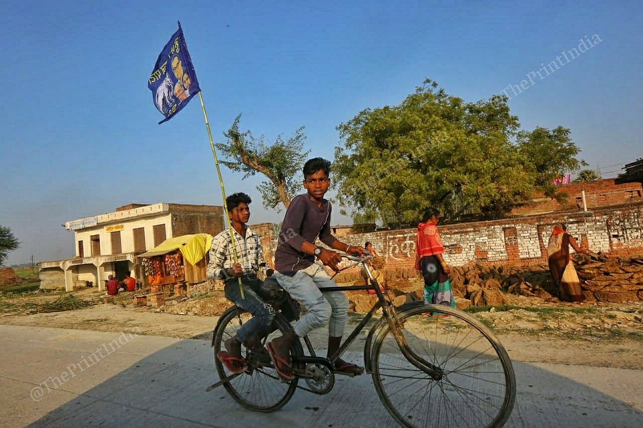 BSP supporters on cycle | Photo: Praveen Jain | ThePrint