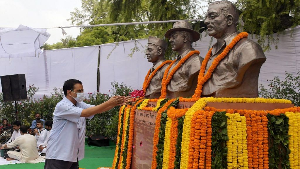 File photo of Delhi Chief Minister Arvind Kejriwal paying tribute to freedom fighters Bhagat Singh, Sukhdev and Rajguru on Bhagat Singh's 114th birth anniversary, at Vidhan Sabha, in New Delhi | ANI