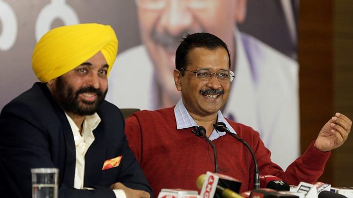 AAP chief Arvind Kejriwal with party's Punjab chief ministerial candidate Bhagwant Mann in Amritsar on 13 February 2022 | ANI File Photo