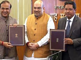Assam CM Himanta Biswa Sarma and Meghalaya CM Conrad Sangma with Union Home Minister Amit Shah, after signing an agreement to resolve the 50-year-old boundary dispute between their states, in New Delhi on 29 March 2022 | ANI