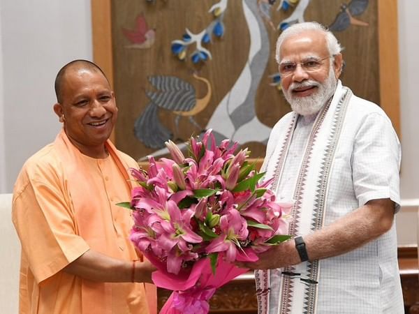 PM Modi hopes Yogi Adityanath will take UP to greater heights of development PM Modi hopes Yogi Adityanath will take UP to greater heights of development