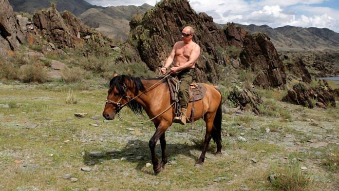 Russian President Vladimir Putin riding a horse, bare-chested. | Photo Credit: Flickr