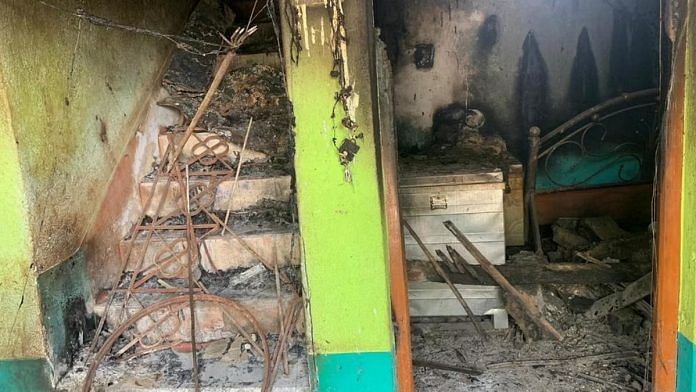 The scorched interiors of one of the houses attacked by arsonists in Bogtui, Birbhum | Photo: Sreyashi Dey | ThePrint