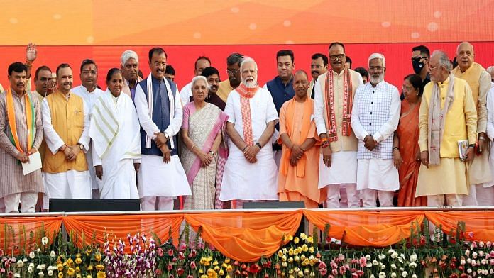 Prime Minister Narendra Modi with UP Governor Anandiben Patel, Uttar Pradesh CM Yogi Adityanath, Deputy CMs Keshav Prasad Maurya and Brajesh Pathak and newly sworn-in UP ministers, during the swearing-in ceremony in Lucknow Friday | ANI