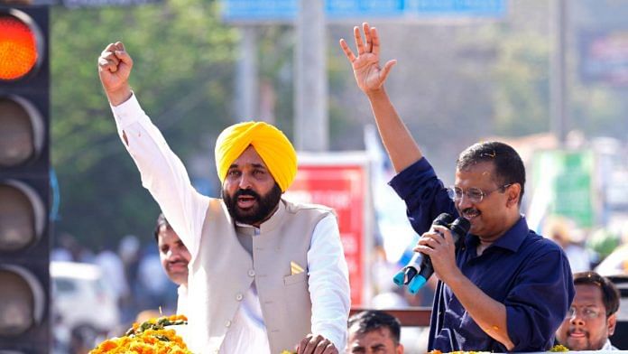 Punjab CM-designate Bhagwant Mann and Aam Aadmi Party National Convener and Delhi CM Arvind Kejriwal at the AAP victory roadshow in Amritsar Sunday | ANI