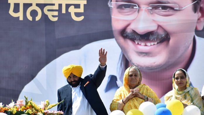 CM-designate Bhagwant Mann with his mother Harpal Kaur during the celebration of Aam Aadmi Party's victory in the Punjab assembly elections, in Sangrur Thursday | ANI