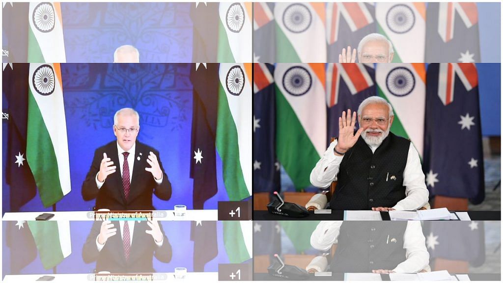 Australian Prime Minister Scott Morrison and Prime Minister Narendra Modi during their virtual summit, on 21 March 2022. | Photo: Twitter/@MEAIndia