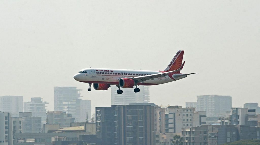 An Air India aircraft prepares to land at the Chhatrapati Shivaji Maharaj International Airport in Mumbai | Photographer: Indranil Mukherjee/AFP/Getty Images via Bloomberg