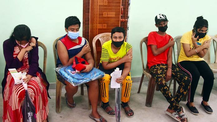 Representational image | Teenagers wait after getting the Covid vaccine jab during a vaccination drive for children aged 15-18 years, in Kolkata