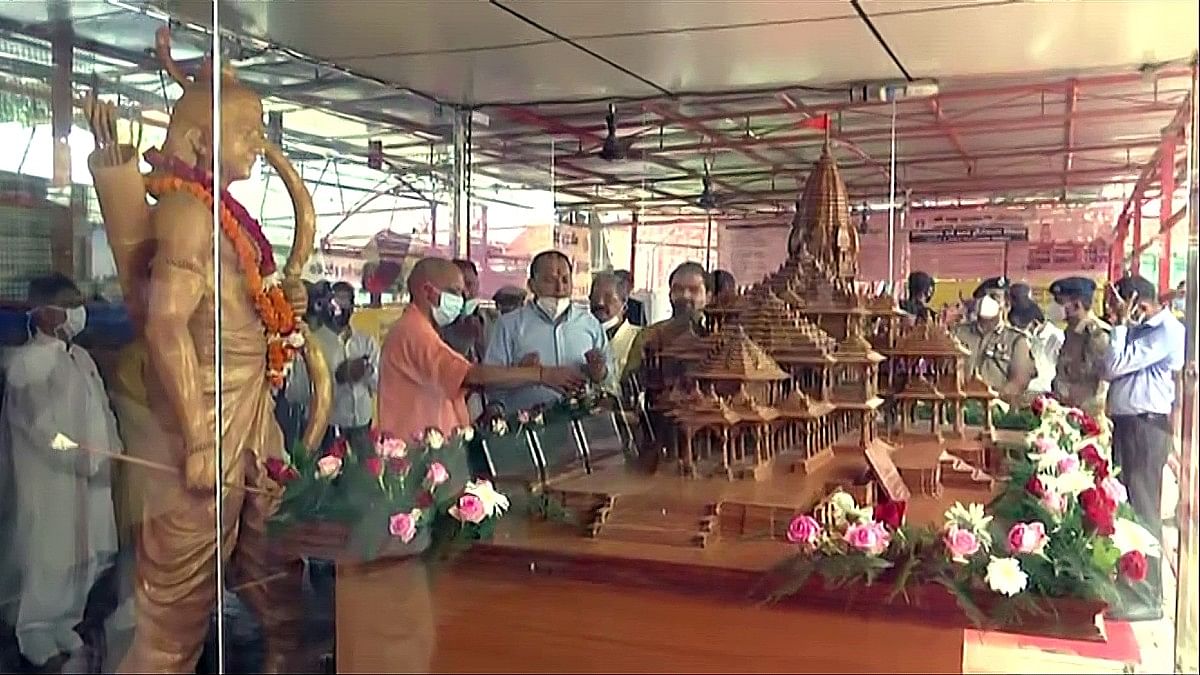 File photo of Yogi Adityanath visiting Ayodhya and offering prayers to a model of the Ram Temple | ANI File photo of Yogi Adityanath visiting Ayodhya and offering prayers to a model of the Ram Temple | ANI