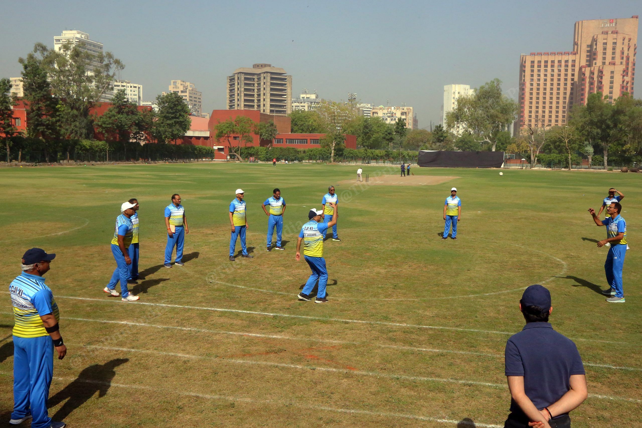 Players of the CJI -Xl warming up at the grounds of the Modern School, Barakhamba Road, New Delhi | Photo: Praveen Jain | ThePrint
