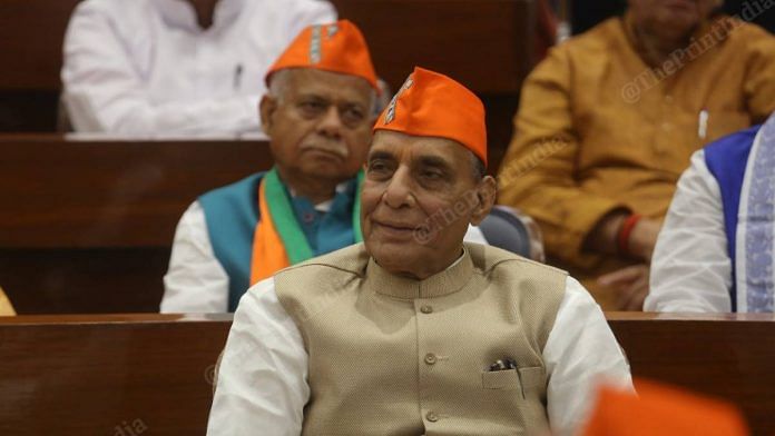 Rajnath Singh attends BJP's Foundation Day function wearing the party's new caps | Photo: Praveen Jain