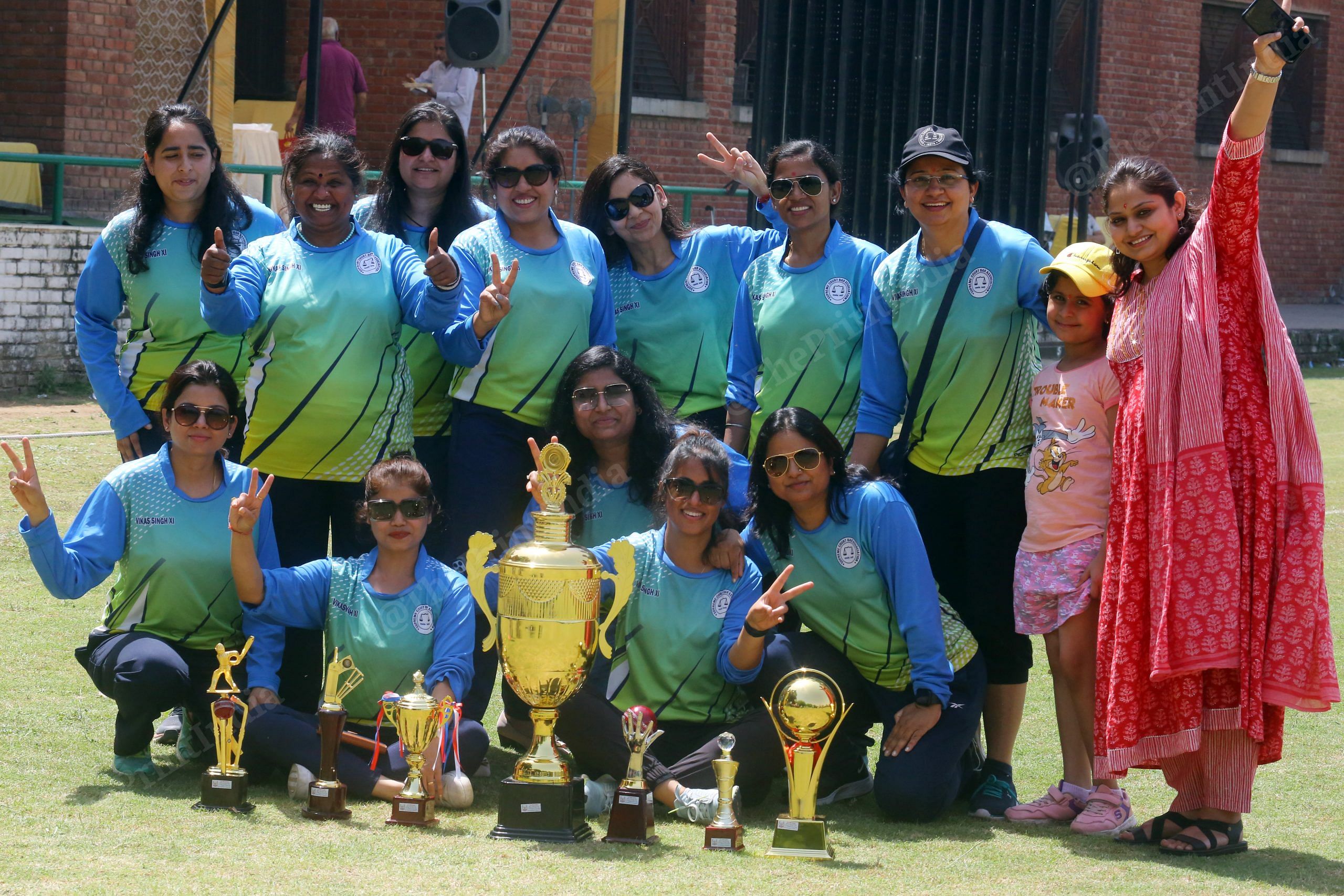 Players of the women lawyers' cricket team pose with trophies | Photo: Praveen Jain | ThePrint