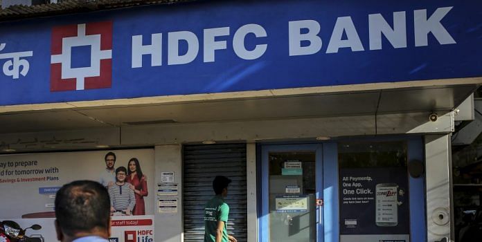 A man walks towards an HDFC Bank Ltd. branch in Mumbai, India (representational image) | Bloomberg
