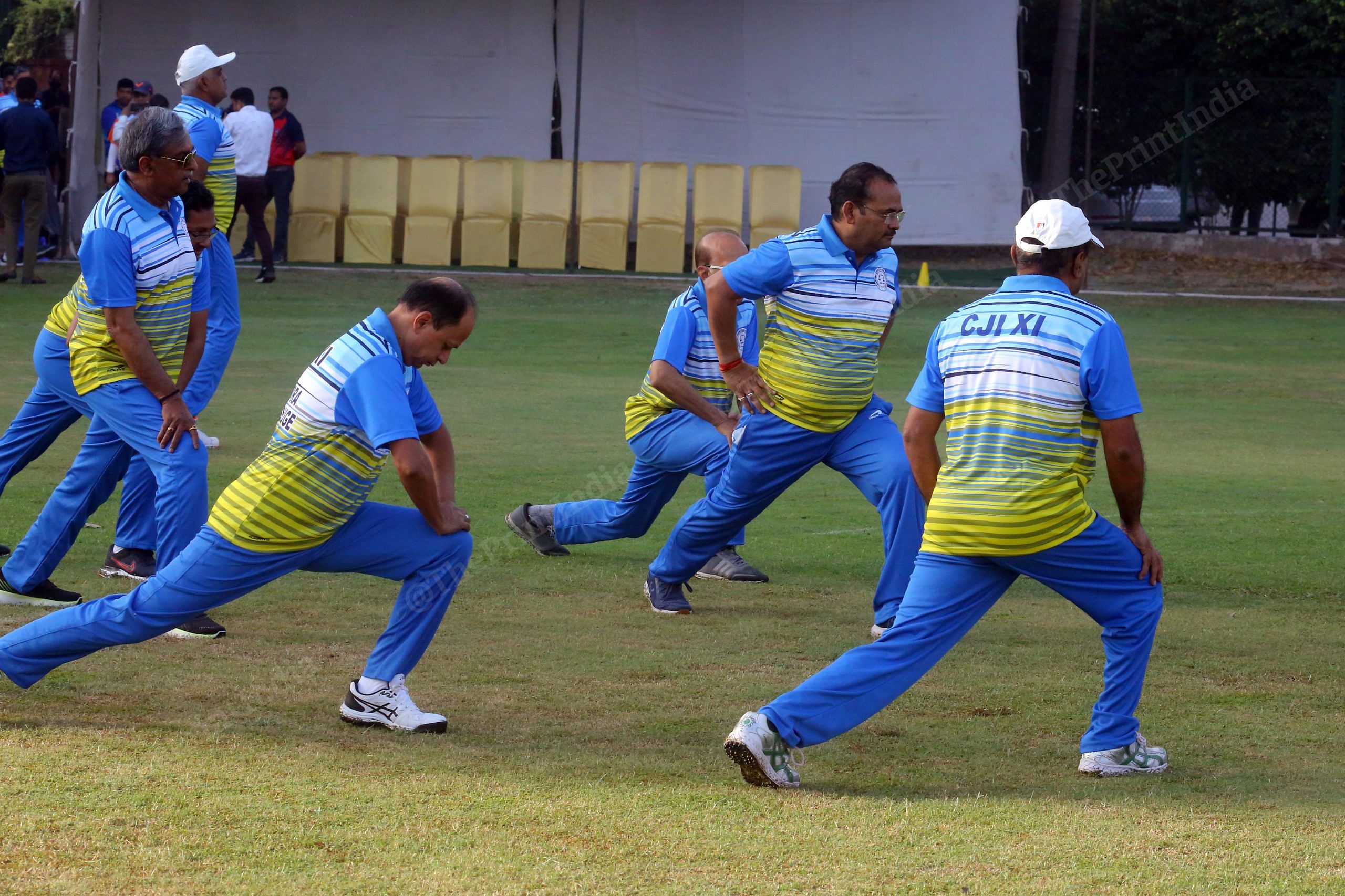 Players of CJI -Xl side warm up before the game begins | Photo: Praveen Jain | ThePrint
