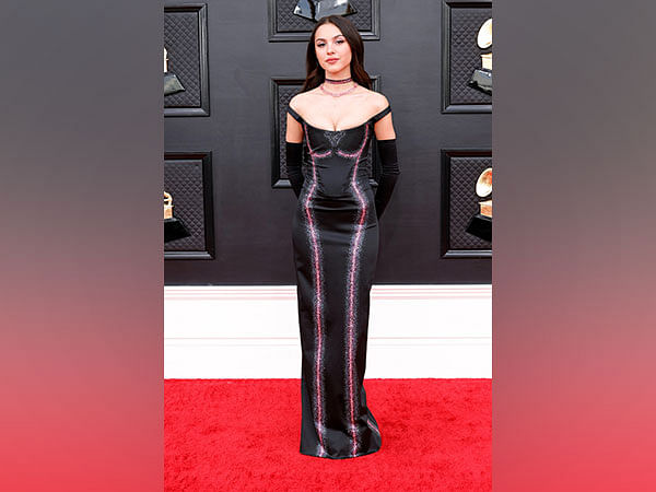 Olivia Rodrigo rocks figure-hugging black gown on Grammys 2022 red carpet