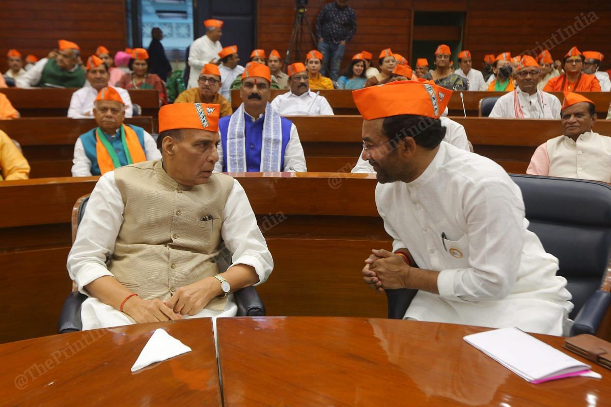 Union Ministers Rajnath Singh and G. Kisan Reddy interact at the BJP's 42nd Foundation Day event at Parliament Annexe | Photo: Praveen Jain | ThePrint