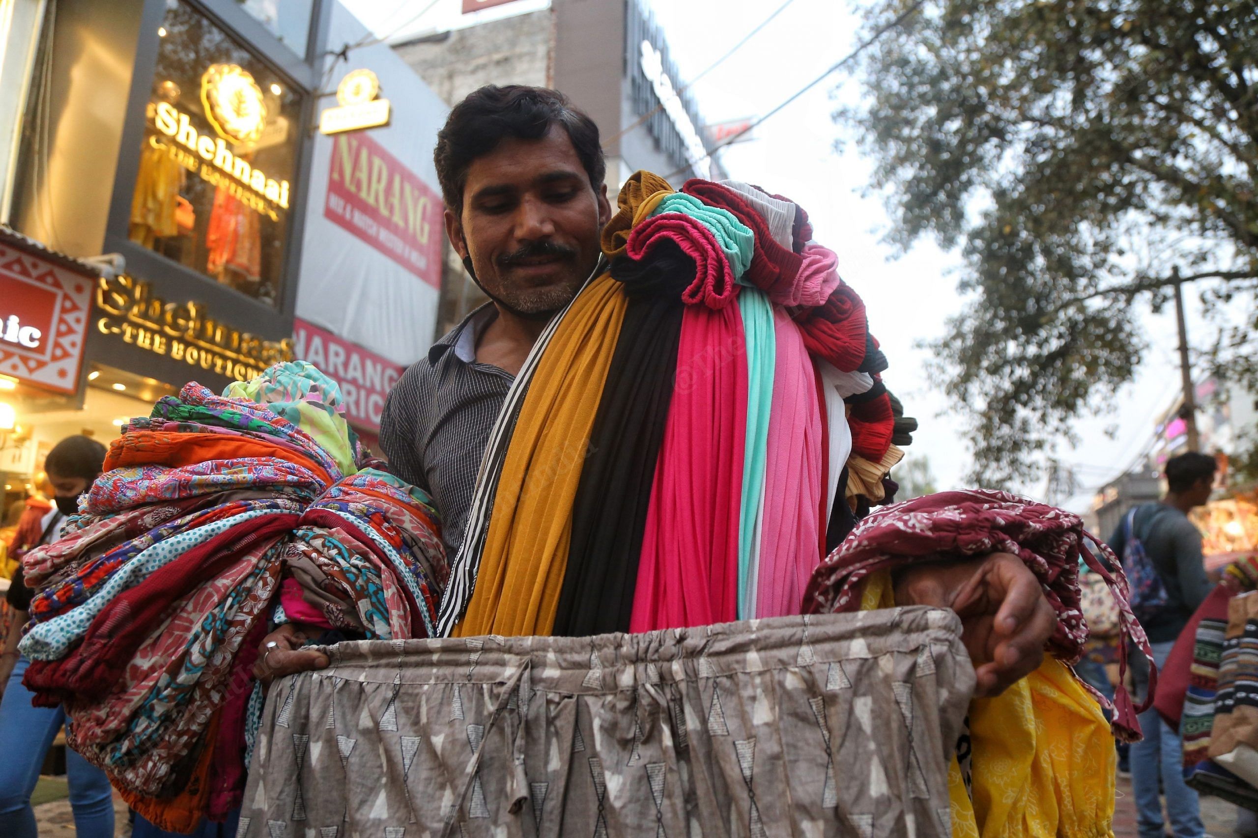 A salesman in Lajpat Nagar market. | Photo Credit: Manisha Mondal