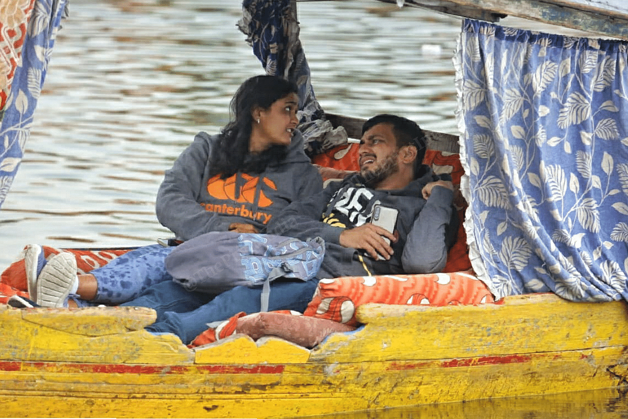 Tourists lounging on a shikara at Dal Lake | Photo: Praveen Jain | ThePrint