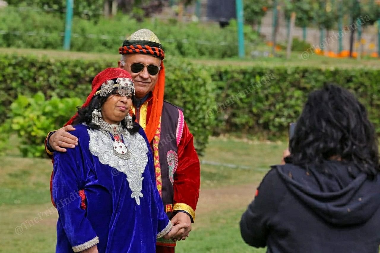 Tourists decked up in traditional Kashmiri attire at Tulip Garden | Photo: Praveen Jain | ThePrint