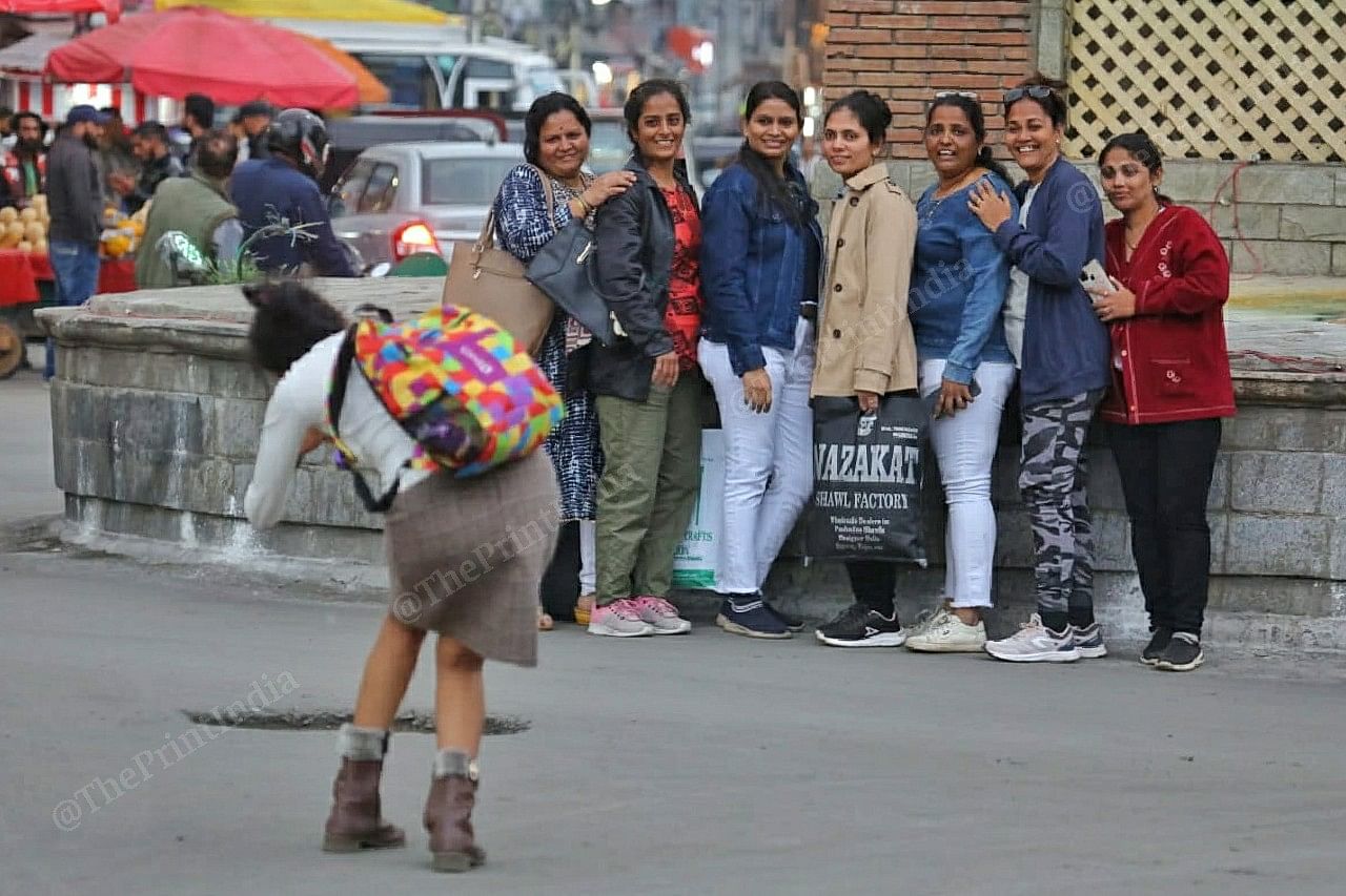 A group of women from Mumbai poses for a picture at Lal Chowk in Srinagar | Photo: Praveen Jain | ThePrint