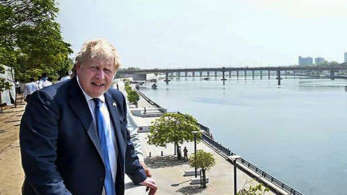 British Prime Minister Boris Johnson at the Sabarmati Riverfront during his visit to Sabarmati Gandhi Ashram in Ahmedabad | Credit: PTI photo