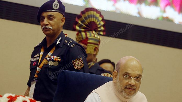Union Home Minister Amit Shah and NDRF Director General Atul Karwal on the first day of the force's Annual Conference on Capacity Building for Disaster Response, at Delhi's Vigyan Bhawan | Praveen Jain | ThePrint