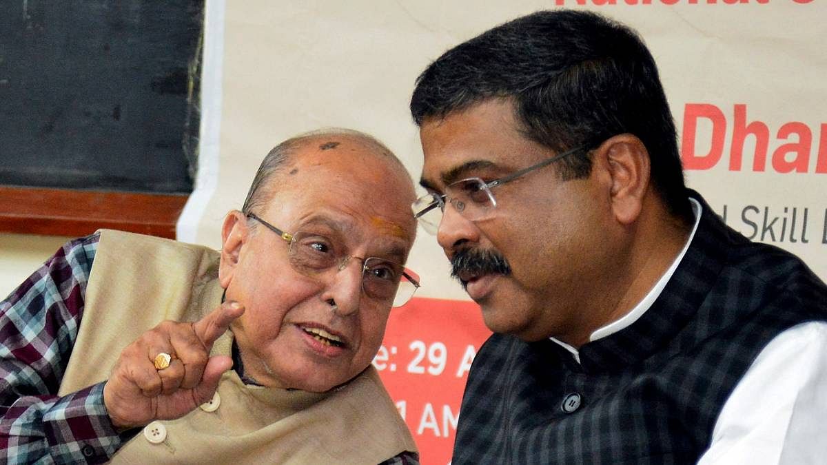 NCF Union Minister for Education Dharmendra Pradhan in conversation with former ISRO Chairman K. Kasturirangan at the release of the mandate document for the NCF at IISc in Bengaluru | ANI photo