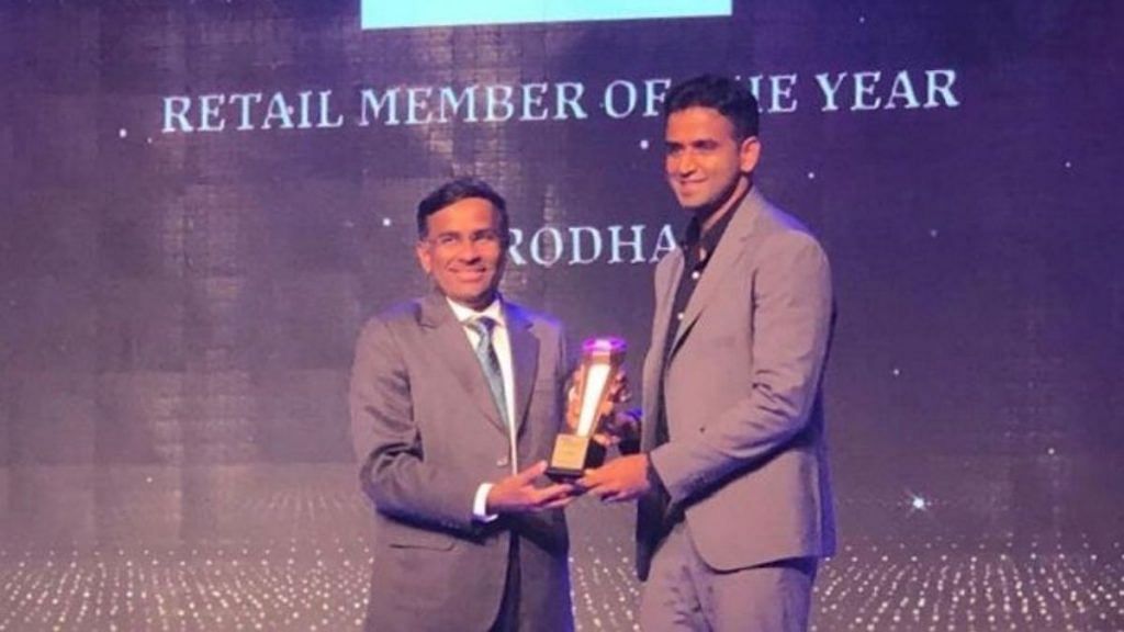 Nithin Kamath receiving an award at the 2019 NSE Market Achievers awards. | Photo Credit: Twitter/@Nithin0dha