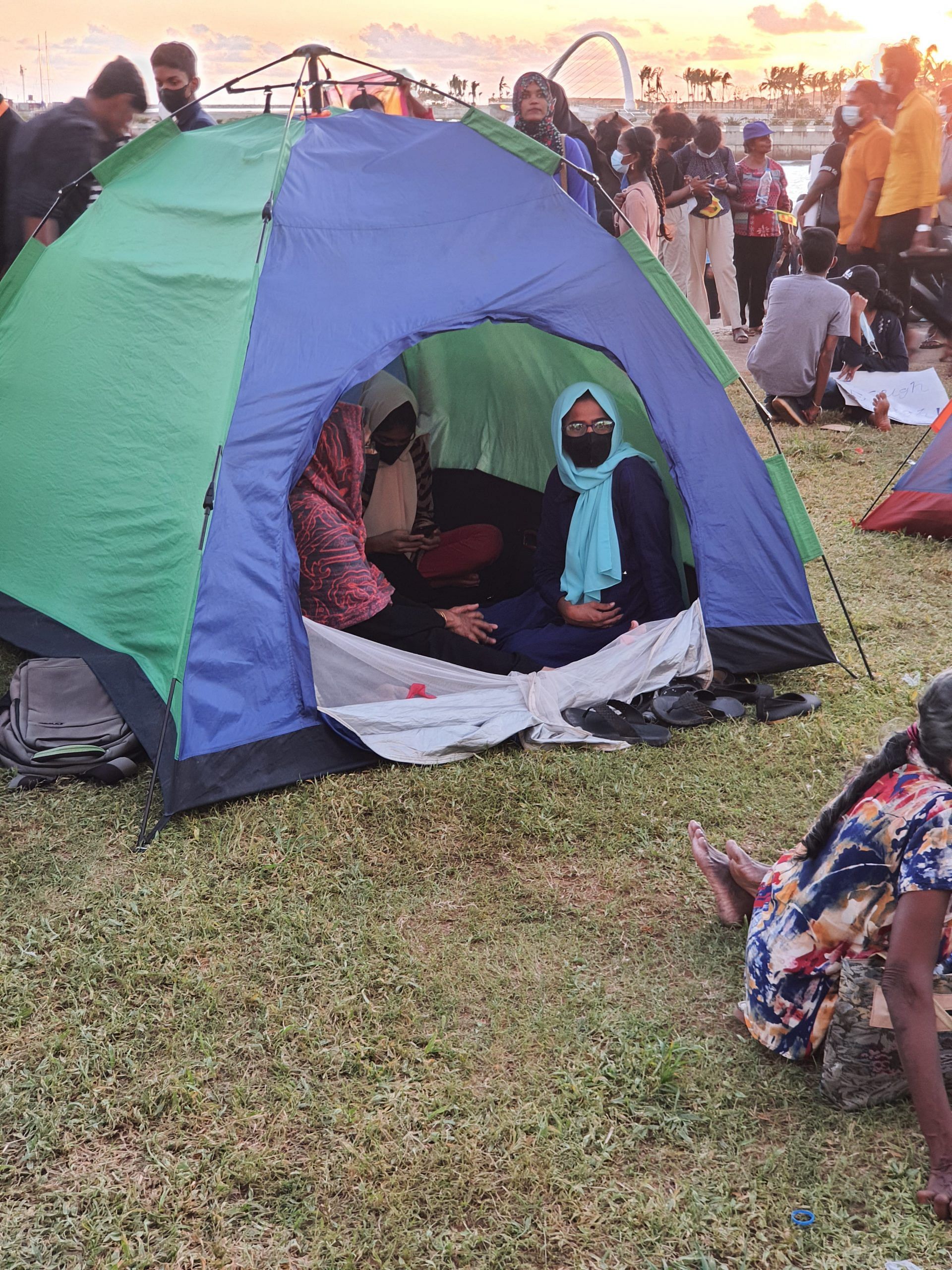 Scores of young men and women are now staying put day and night, right next to the Presidential Secretariat, in what looks like a tent city of resistance. | Photo: Regina Mihindukulasuriya