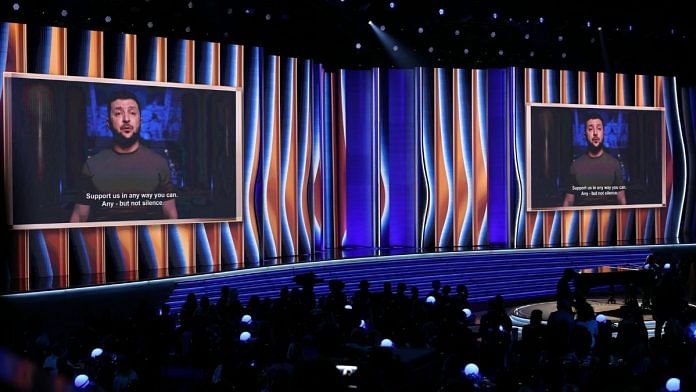 Ukrainian President Volodymyr Zelensky speaks on screen during the Grammy Awards, on 3 April 2022 | Bloomberg