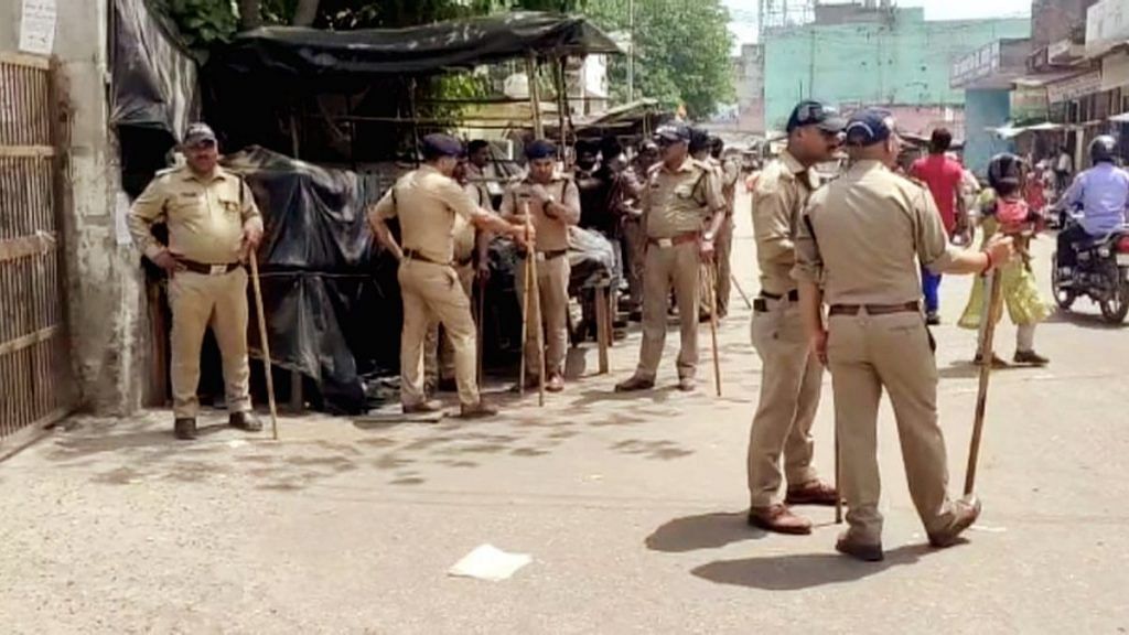 Police personnel deployed as Section 144 has been imposed in entire village ahead of the Mahapanchayat, at Dada Jalalpur Village, in Haridwar on 26 April 2022 | Photo: ANI