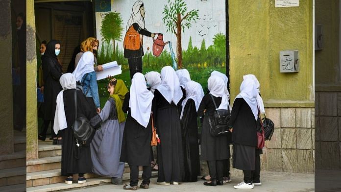 Girls arrive at their school in Kabul on 23 March, 2022 | Photographer: Ahmad Sahel Arman/AFP/Getty Images via Bloomberg