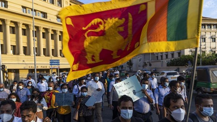 Demonstrators in Colombo call for resignation of President Gotabaya Rajapaksa and his brother, Prime Minister Mahinda Rajapaks, Sri Lanka, on 18 April 2022 | Photographer: Buddhika Weerasinghe/Bloomberg