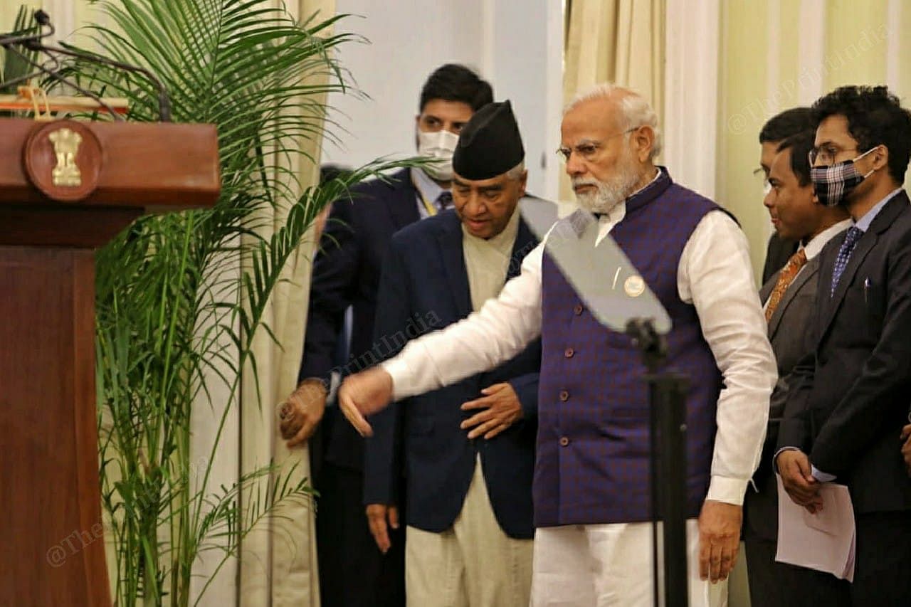 PM Narendra Modi and his Nepalese counterpart Sher Bahadur Deuba enter Kailash Hall for the signing of agreements | Photo: Praveen Jain | ThePrint